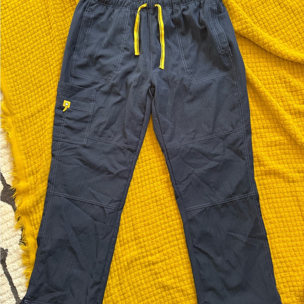 Women’s navy Wink scrub pants with Yellow Accents